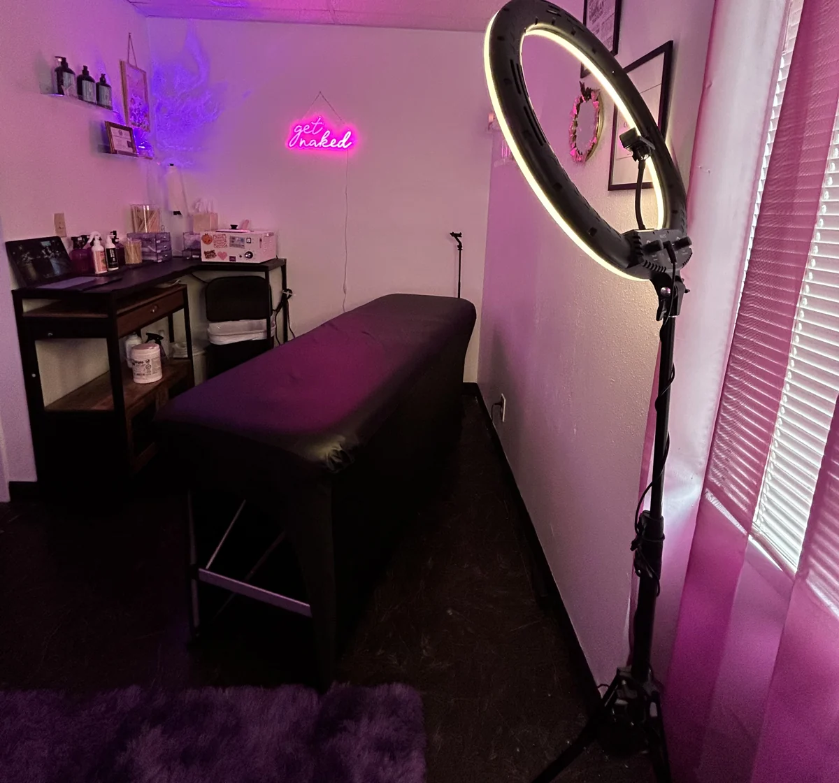 Another view of the studio’s treatment bed and lighting